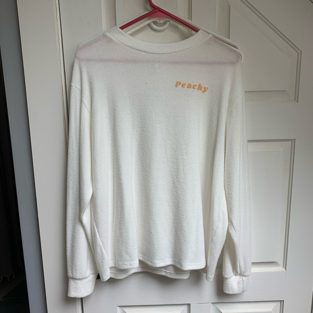 Long sleeve peachy sweater.